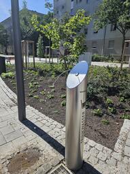Vergrößerte Ansicht von Der Trinkwasserbrunnen auf dem neuen Quartiersplatz T 4 / T 5